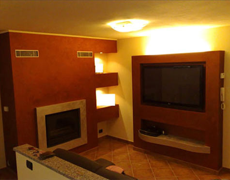 rivestimento camino, libreria e porta TV in cartongesso